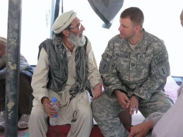 Yllescas chats with Afghan elder at Camp Keating